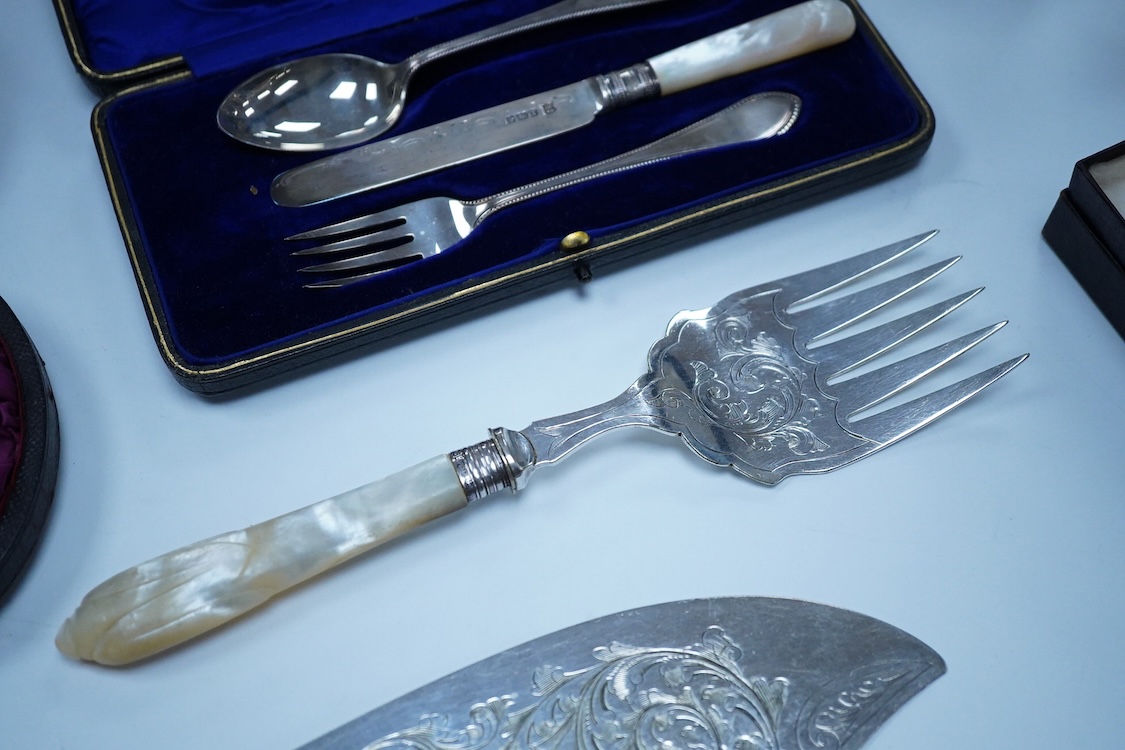 A cased pair of George III engraved silver Old English pattern berry spoons, by Smith & Fearn, London, 1794/5, 22.6cm, together with a cased Edwardian silver christening trio, an 800 standard mustard pot with white metal